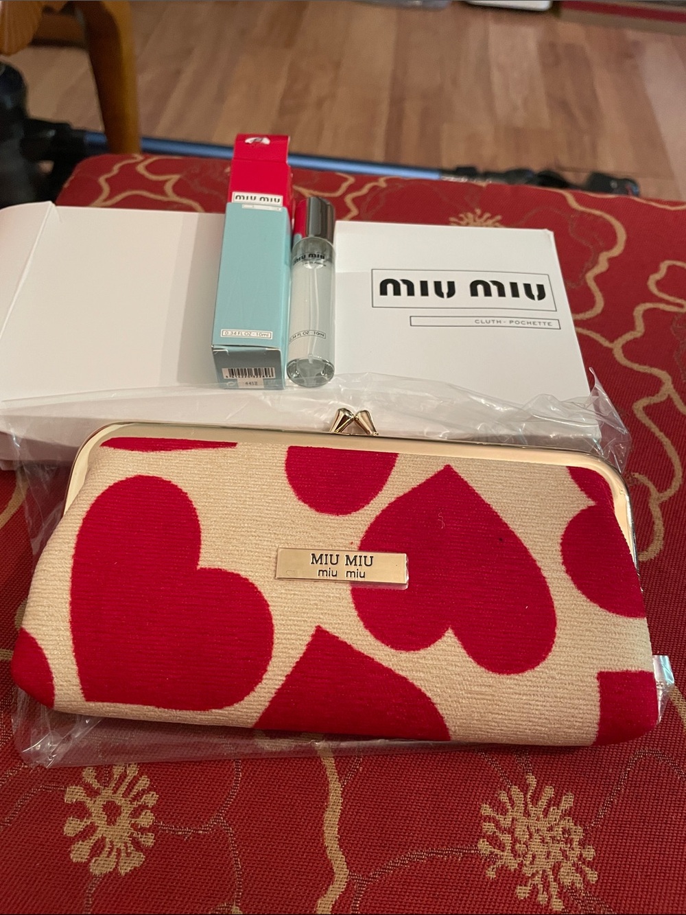 Miu Miu Beige heart pochette with fragrance
